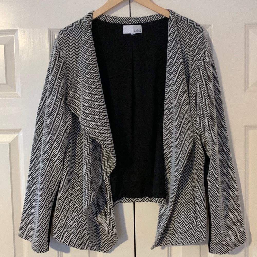 Beautiful black and white blazer with flattering drape effect